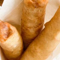 Impossible Lumpia (4) · Vegan. Vegetarian. Deep fried lumpia  with Impossible meat served with tangy sweet and sour ...