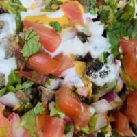Birria Fries · Crispy crinkle cut french fries topped with nacho cheese, pico de gallo, sour cream, and bra...