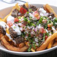 Nacho Fries · Fresh, crinkle cut french fries topped with nacho cheese, pico de gallo, and sour cream.