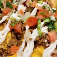 Impossible Fries · Vegetarian. Fresh, hand cut french fries topped with nacho cheese, pico de gallo, sour cream...