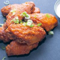 Buffalo Wings (6) · Fresh fried chicken wings tossed with homemade buffalo sauce. Served with house-made ranch.