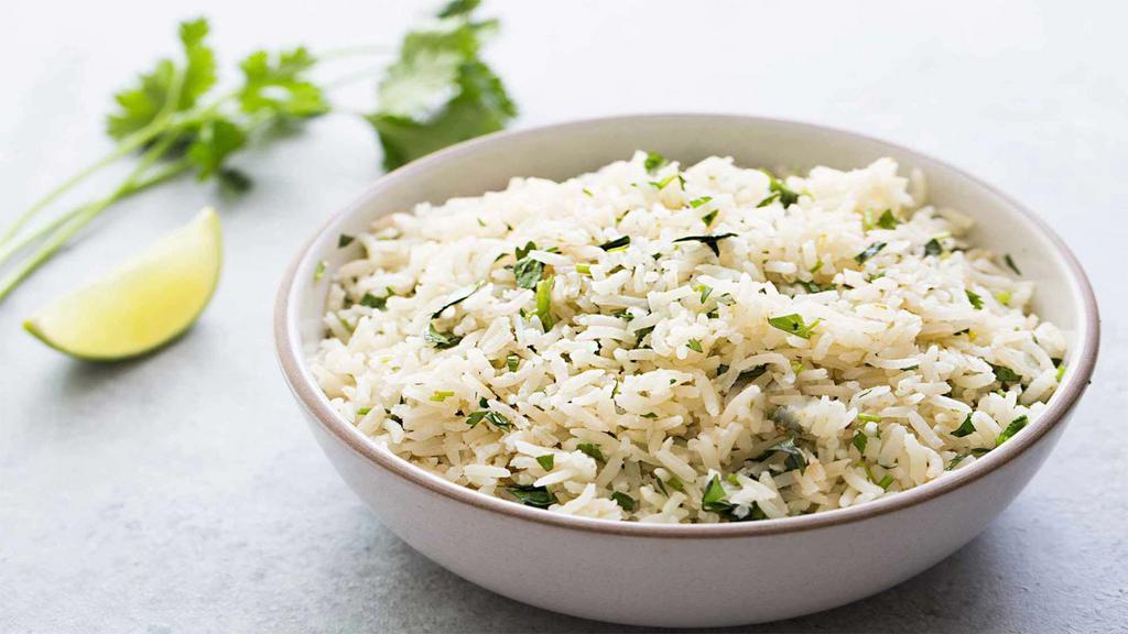 Cilantro Rice (5 oz.) · Homemade cilantro rice made to perfection.