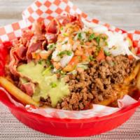Carne Asada Fries · House Specialty! Classic fries with a generous helping of seasoned carne asada, onions, cila...