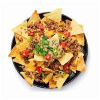 Nachos · Crispy tortilla chips topped with cheese, beans, sour cream, guacamole, and your choice of v...