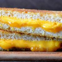 Classic Grilled Cheese · American and cheddar cheese on Parmesan sourdough. Just like Mom used to make - only better!