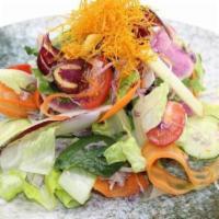 Aoba Salad · Spring mix salad, romaine lettuce, cherry tomatoes, cucumber, tamari garlic dressing.