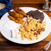 Chapin · 2 scramble eggs with tomato and beef frank 
Refried plantains
Sour cream
Fresh cheese
Beans ...