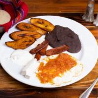 Ranchero · Refried plantains
Sour cream
Fresh cheese
Slices of fried frank beef
2 sunny side eggs (spec...