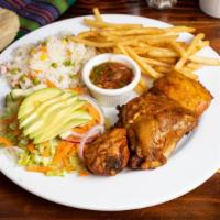 Pollo dorado and papas chapinas · 2 pieces of chicken ( thigh, and leg)
Fried potatoes topped with mayonnaise, mustard, ketchu...