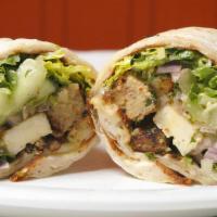 Paneer Wrap · Fried paneer (indian cottage cheese), potato patty, cucumbers, tomatoes, cilantro, onions, s...