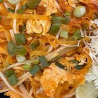 Pad Thai · Traditional thai style pan-fried rice noodles with egg, bean sprouts, and greed onions, serv...