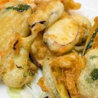 Mixed Vegetable Tempura · Mixed vegetables battered and crispy fried served with plum sauce.