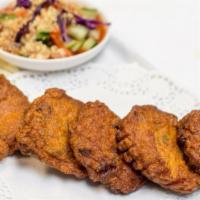 Fish Cakes (5 Pieces) · Deep-fried fresh fish blended with curry paste, chopped green beans, and fine cut kaffir lea...