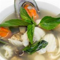 Potak Mixed Seafood Soup (Large) · Clear hot and sour soup mixed with scallops, squids, fish, mussels, and prawns, flavored wit...