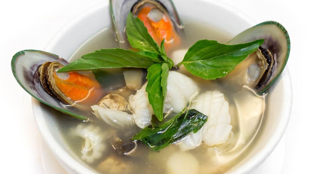 Potak Mixed Seafood Soup (Small) · Clear hot and sour soup mixed with scallops, squids, fish, mussels, and prawns, flavored with kaffir leaves, lemon grass, mushrooms, ginger, galangal, and basil.