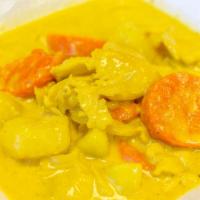 Yellow Curry ￼ · Popular. Yellow curry paste in coconut milk with potatoes, carrots, and onions.