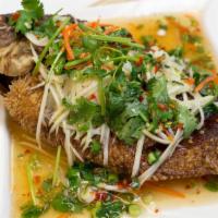 Special Pompano · Crispy fried whole pompano fish with chili sauce, mushrooms, bell peppers, onion, and cilant...