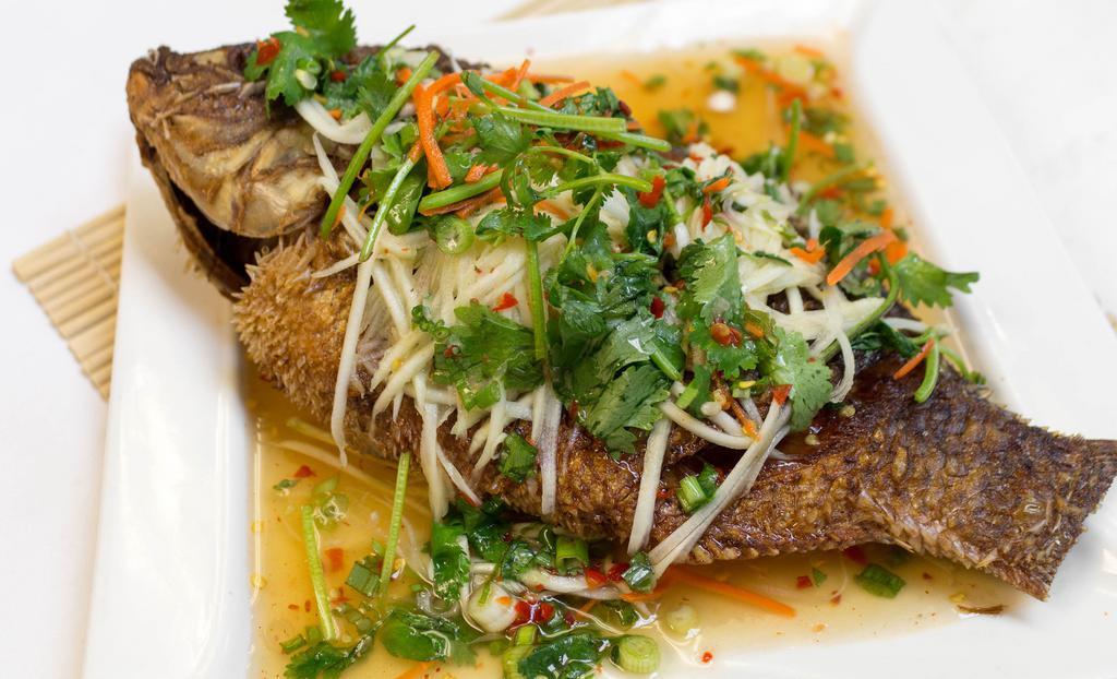 Special Pompano · Crispy fried whole pompano fish with chili sauce, mushrooms, bell peppers, onion, and cilantro.