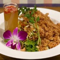 Deconstructed Crispy Yellow Fin Tuna Salad · Laotian style crispy tuna salad + green apple + roasted cashew + onion W/ “Yum” spicy dressi...