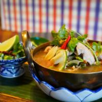 Tom-Yum Chicken  · Laotian spicy sour soup + sliced free range chicken + mushroom