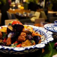 Spicy Eggplant · Wok fried purple èggplant + tofu + bell pepper + Thai basil + chili garlic W/oyster sauce