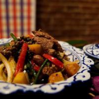 Pad Pha Beef · Wok fried beef flank + green peppercorns + kaffir lime leaves + Thai basil + chili garlic + ...