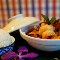 Totally Prawns · Coconut milk red curry + jumbo tiger prawns + pineapple + lychee W/ toasted peanut