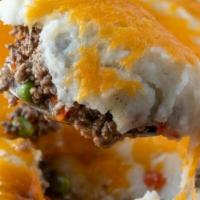 SHEPHERD'S PIE W/ STEAMED VEGETABLES · FAMILY RECIPE W/ SAVORY GROUND BEEF, CARROTS, PEAS, CORN, ONIONS IN A RICH GRAVY. TOPPED WIT...