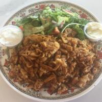 21. Chicken Pomegranate Plate · Slices of chicken shawarma and pomegranate molasses served with rice pilaf, salad, tzatziki,...