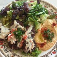 17. Falafel Plate · Vegetarian. Five falafel served with hummus and salad.