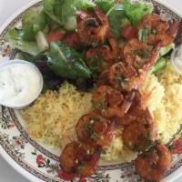 Shrimp Kabobs Plate · 12 shrimp served with rice pilaf, salad, and garlic sauce.