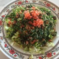 Tabouleh Salad · Vegetarian. Parsley, mint, tomatoes, green onions, and bulgur.