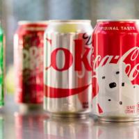 46. Soft Drinks · Your choice of Coca Cola, Diet Coke, Sprite, Strawberry Fanta, or Lemonade..