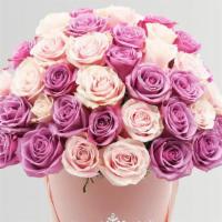 Signature Lavender & Pink Roses in a Box · Throughout history, roses have always been considered as the flower of elegance, love, roman...