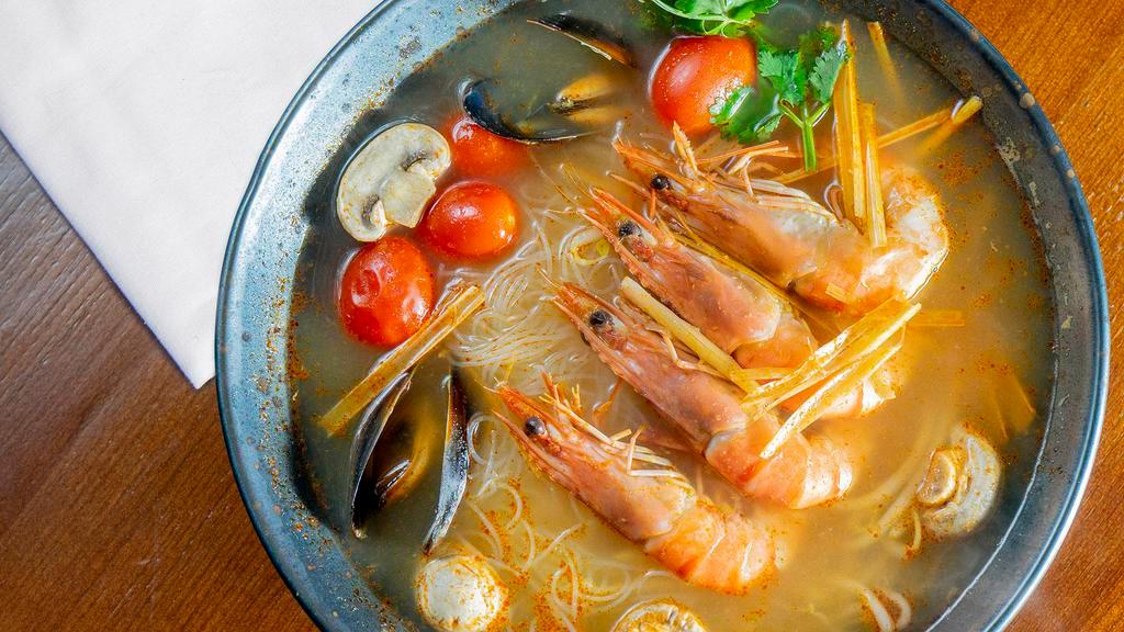 14. Tom Yum Rice Noodles Soup · Hot. With tiger prawns, lemon grass, chili, fresh mushrooms, coriander and lemon leaf.