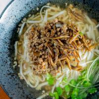 13. Singapore Ramen Soup · With fried dried fish, minced pork, mushrooms, pea tip vegetable.