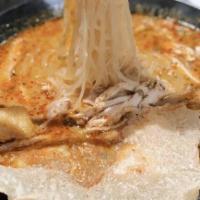 21. Indonesia Curry Chicken Fate Egg Noodle  · Spicy curry mixed with chicken and fat egg noodles