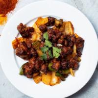 Gobi Manchurian · Cauliflower pieces dipped in corn batter and fried with soy sauce, tomatoes, chilies and gar...