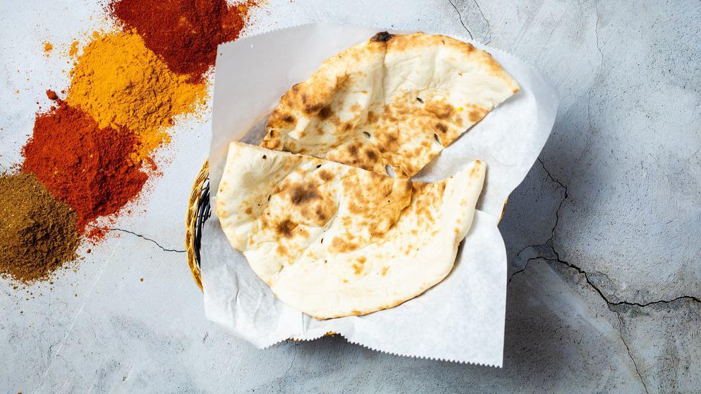 Plain Naan · Oven lovin' with freshly baked bread in a clay oven.