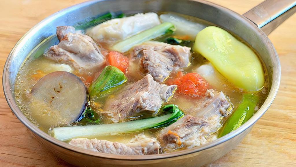 Sinigang  · Tamarind-flavored soup made with tender pork ribs, eggplant and spinach. Gluten Free.

Size 32oz deli container.