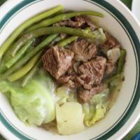Nilaga · Boneless Beef braised in seasoned broth until fork-tender and then mixed with potatoes, carr...