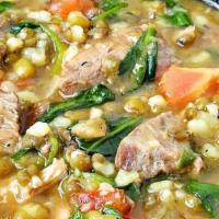 Ginisang Munggo (Mung Bean Stew) · Mung bean stew made with pork, mung beans, garlic, tomatoes, onions and spinach. Thick, hear...