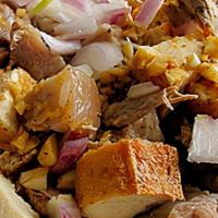 Tokwat Baboy · Deep-fried tofu and Pork Belly topped with onions and chiles (optional). Pour the savory dre...
