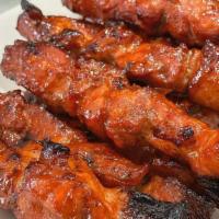 Pork Bbq (Skewered) · Filipino Pork Barbecue is a popular street food treat in the Philippines. Thin slices of por...