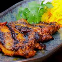 Chicken Inasal (grilled chicken) · Chicken Thighs marinated in a special mixture of seasonings and spices and then grilled to p...