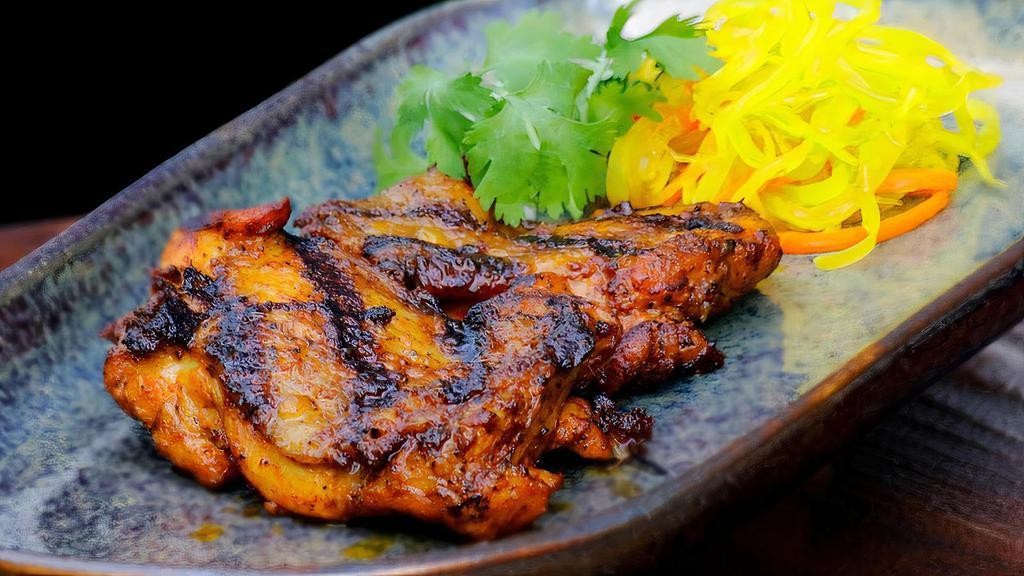 Chicken Inasal (grilled chicken) · Chicken Thighs marinated in a special mixture of seasonings and spices and then grilled to perfection. Served with dipping sauce (regular or spicy) and our in-house atchara (pickled papaya & carrots).
