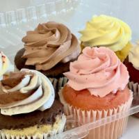 Pack (6) Cupcakes · Six delicious cupcakes of your flavor choice with light and fluffy frosting.