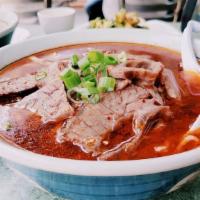 13.Braised Beef Noodle Soup 红烧牛肉面 · Served spicy.