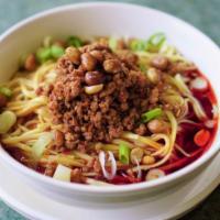 12.  Dandan Noodle 担担面 · Served spicy. Red chili oil sauce, sesame sauce, peanut sauce, minced pork and scallions.