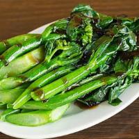 Chinese Broccoli芥兰 · Served with oyster sauce.